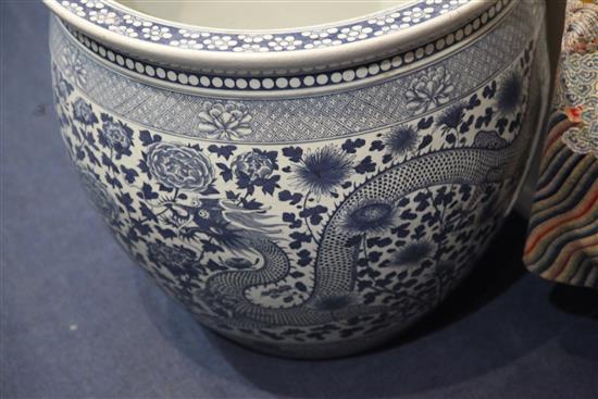 A pair of massive Chinese blue and white jardinieres or fish bowls, of recent manufacture, diam.62.5cm